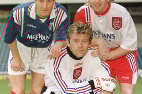 Richard Gough, Andy Goram and Stuart McCall show off their new Adidas shirts 