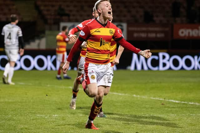 Partick Thistle's Kyle Turner celebrates after scoring to make it 2-0