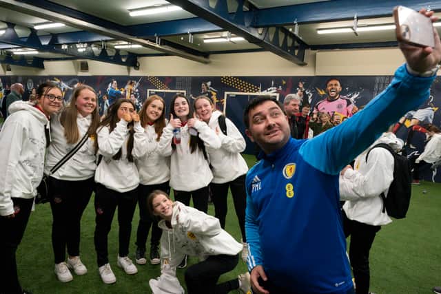 Scotland Women’s National Team head coach Pedro Martínez Losa poses for photographs with the girls
