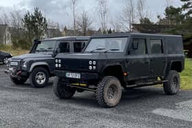 Munro EV, pictured beside a mid-teens Land Rover Defender at Gleneagles Estate