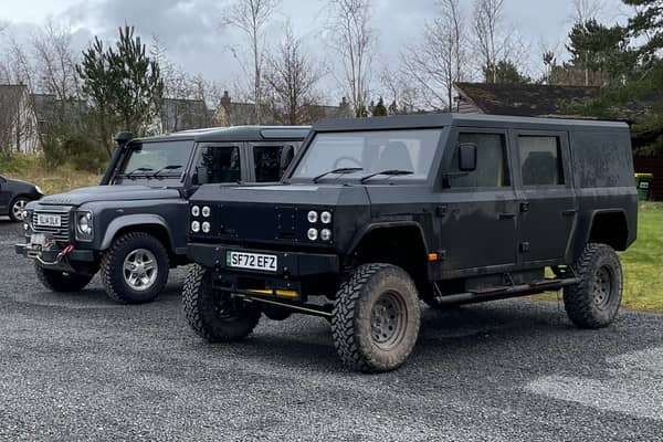 Munro EV, pictured beside a mid-teens Land Rover Defender at Gleneagles Estate