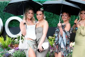 Aintree's best dressed ladies show off before the start of the Grand National tomorrow