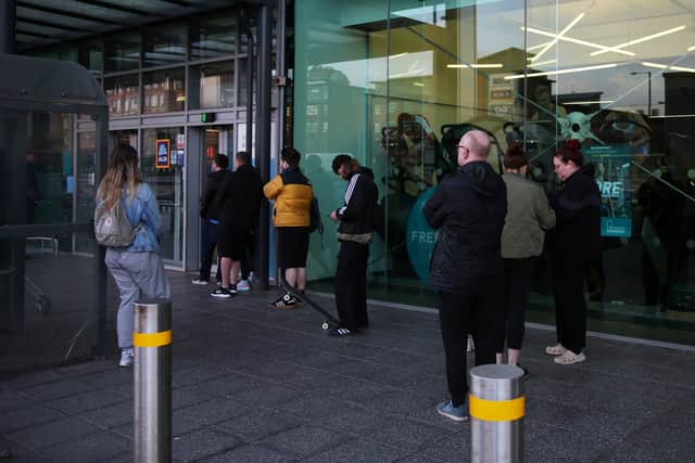 Shoppers queue up at Aldi in Ancoats, Manchester today to buy the new flavours of the viral energy drink Prime, which is limited to one flavour per customer (SWNS)