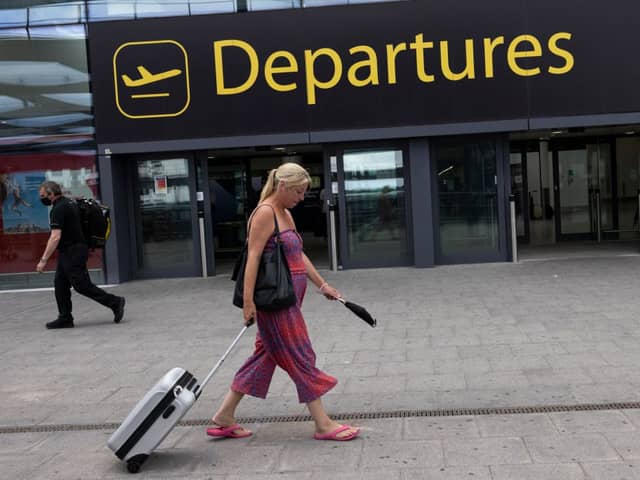 Travellers at Gatwick Airport on July 30, 2021 in London, England. (Photo by Dan Kitwood/Getty Images)