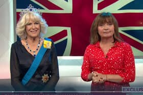 Lorraine Kelly poses with Queen Consort Camilla’s waxwork