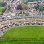 A giant penis has appeared on a “perfect lawn” at one of Britain’s most exclusive streets - just days before a Coronation party is due to take place there. 