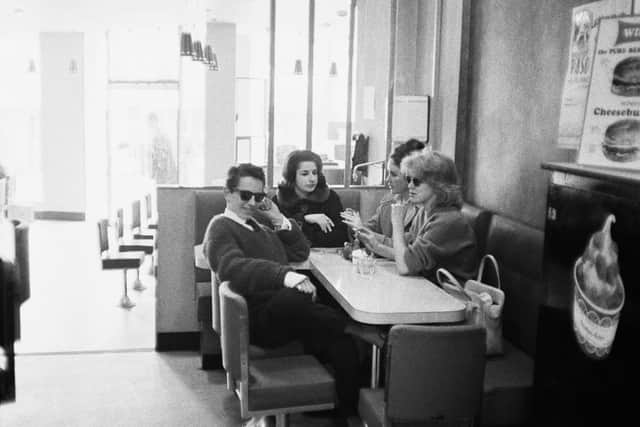 A group of teenagers at a Wimpy Bar, London, April 13th 1960. (Photo by Evening Standard/Hulton Archive/Getty Images)