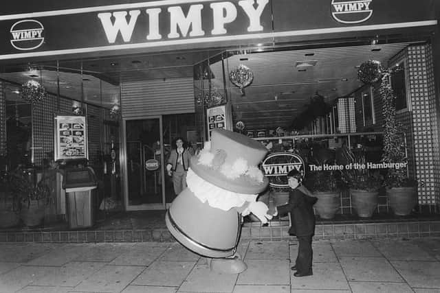 The Wimpy Beefeater mascot welcomes guests to a children's party(Photo by Ian Tyas/Keystone/Hulton Archive/Getty Images)