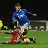 Borna Barisic of Rangers vies with Matty Kennedy of Aberdeen 