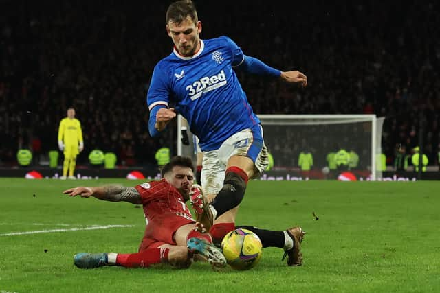 Borna Barisic of Rangers vies with Matty Kennedy of Aberdeen 