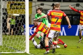 Jack McMillan (right) celebrates after Kyle Turner opens the scoring for Partick Thistle.
