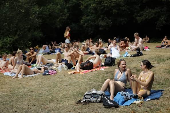 The UK is set to experience warmer weather over the next few days. (Photo credit should read TOLGA AKMEN/AFP via Getty Images)