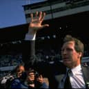 Billy McNeill waves to the crowd in celebration after winning the Scottish Cup Final against Dundee United at Hampden Park