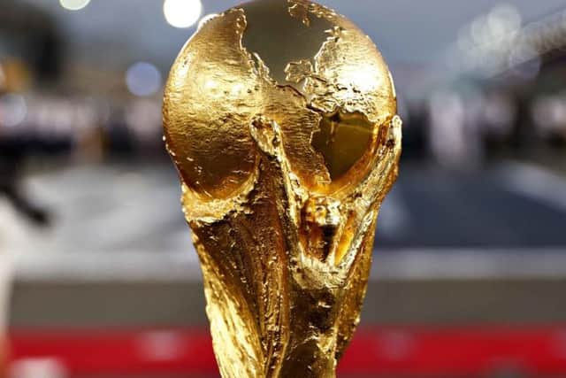 In November 32 nations will compete for the FIFA World Cup trophy (photo: Mark Thompson/Getty Images)