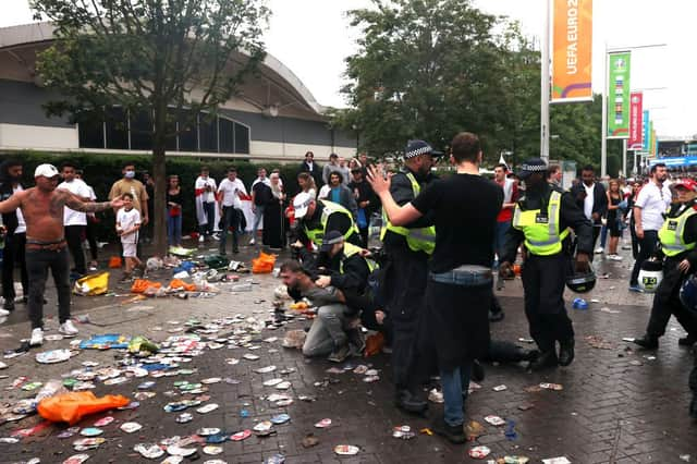 Police break up a fight during the UEFA Euro 2020 Championship Final between Italy and England at Wembley Stadium (Getty Images)