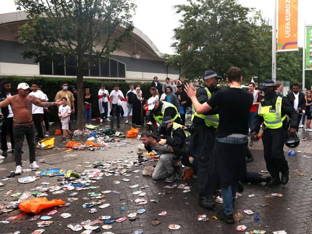 Police break up a fight during the UEFA Euro 2020 Championship Final between Italy and England at Wembley Stadium (Getty Images)