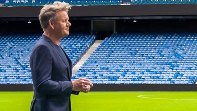 Gordon Ramsay addresses contestants from the pitch at Ibrox. 