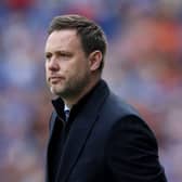 Rangers manager Michael Beale looks on during a match