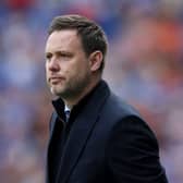 Rangers manager Michael Beale looks on during a match