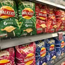 Crisp packets in the supermarket (Shutterstock)