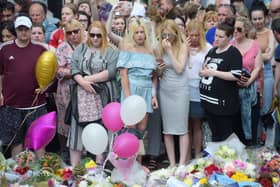 Floral tributes after a minute's silence in St Ann's Square, Manchester, to remember the victims of the terror attack in the city. A report examining security at Manchester Arena where 22 people were murdered and hundreds were injured in a suicide bombing at the end of an Ariana Grande concert in May 2017 was published today. (Photo: PA)