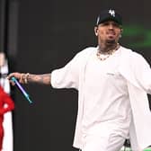 American rapper Chris Brown could be arrested over an alleged nightclub assault if he comes back to the UK.  (Photo by Candice Ward/Getty Images)