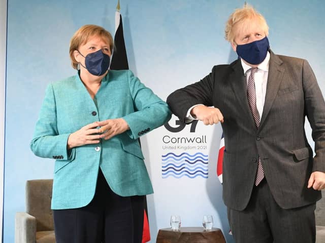 Prime Minister Boris Johnson greets German Chancellor Angela Merkel, ahead of a bilateral meeting during the G7 summit in Carbis Bay (Photo: Stefan Rousseau - WPA Pool/Getty Images)