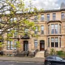 The front of the blonde sandstone property looking out onto Kingsborough Gardens in Hyndland