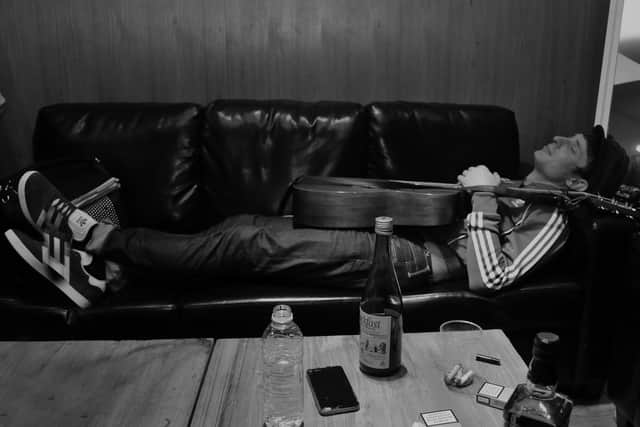 Glasgow artist Gerry Cinamon enjoys a peaceful kip following an imbibing of the tonic wine (Pic: Brian Anderson)