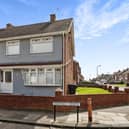 A three-bedroom home has gone up for sale with an interesting feature - a wall with a huge Peaky Blinders mural. 