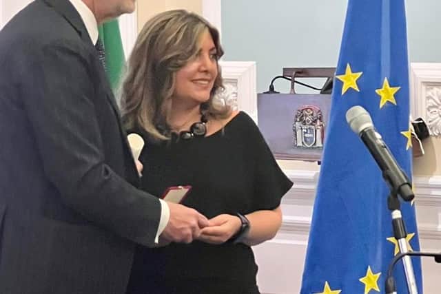 Giovanna Eusebi receiving the title of Cavaliere from Italian Ambassador to the UK,