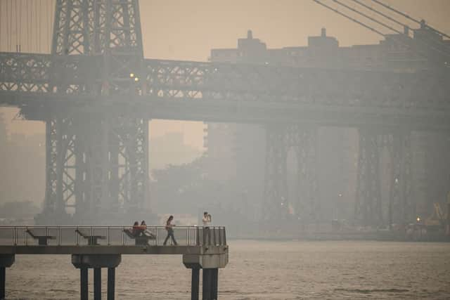 The New York city skyline and east river shrouded in smoke in Brooklyn as smoke from the hundreds of wildfires blazing in eastern Canada drifted south (Photo: Getty Images)