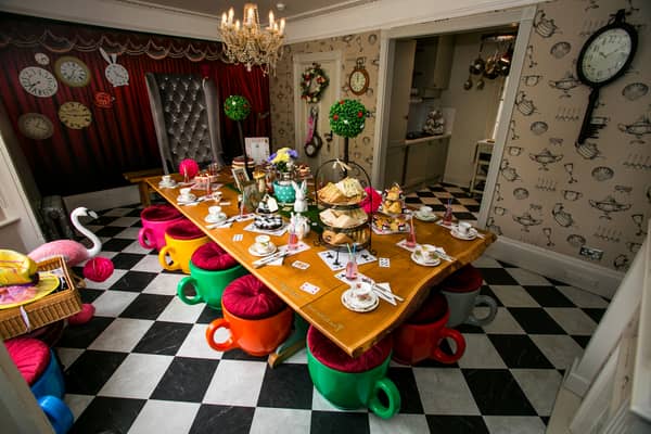 Inside one of UK’s oldest homes transformed into Alice in Wonderland rental with teacup stools & teapot taps