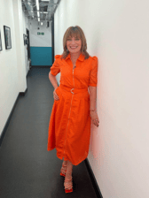 Lorraine matched with a fellow ITV star this week in a bright orange dress