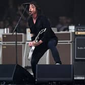 Dave Grohl and the Foo Fighters, performing as The Churnups, play on the Pyramid Stage on day 3 of the Glastonbury festival in the village of Pilton in Somerset, southwest England, on June 23, 2023. The festival takes place from June 21 to June 26. (Photo by Oli SCARFF / AFP) (Photo by OLI SCARFF/AFP via Getty Images)