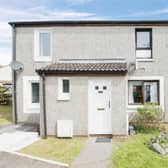 Charming 2-bed end terrace house in Glasgow with a cosy space for entertaining on the market for £110,000