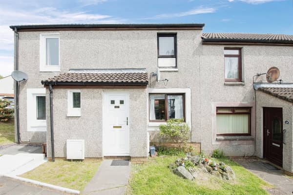 Charming 2-bed end terrace house in Glasgow with a cosy space for entertaining on the market for £110,000