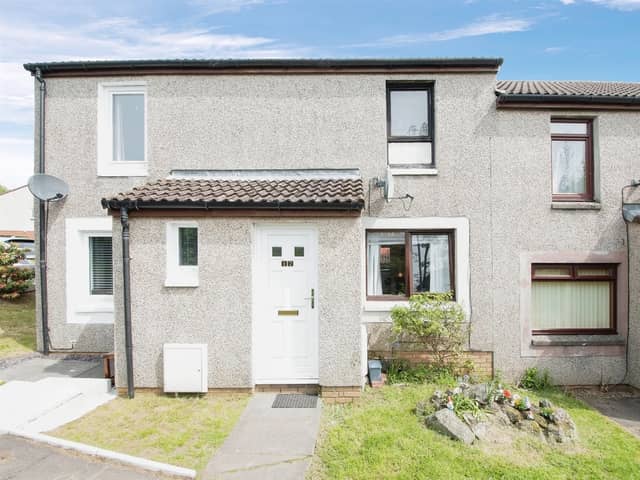 Charming 2-bed end terrace house in Glasgow with a cosy space for entertaining on the market for £110,000