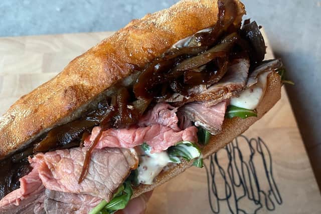 The French dip, a crusty baguette filled with thin-sliced roast beef, wholegrain mayo, caramelised onions, melted gruyere cheese with a pot of beef jus on the side for dipping. Pick it up in Partick.