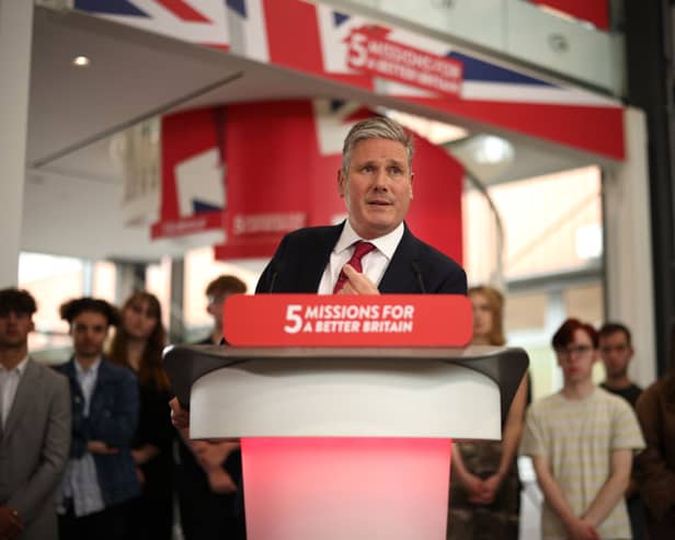 Sir Keir Starmer heckled on stage by green protesters who demand ‘no more U-turns’ from Labour leader 