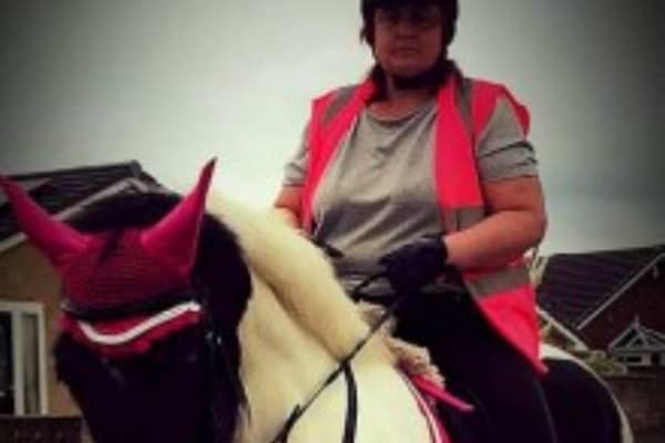 Michelle Hanney pictured riding a horse. (DWP/SWNS)