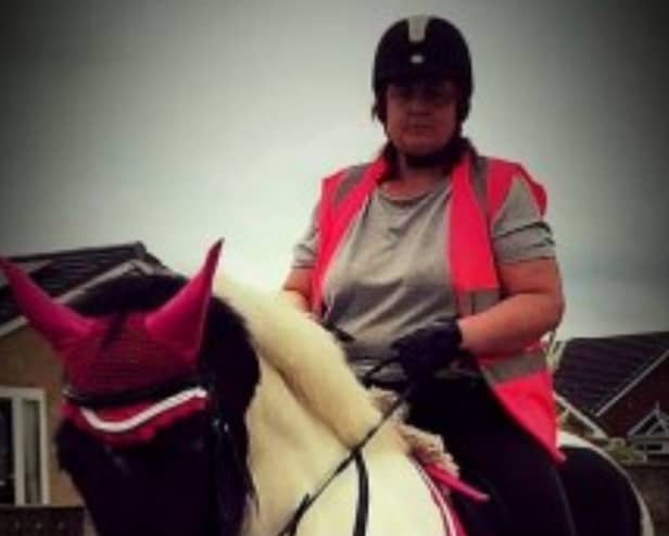 Michelle Hanney pictured riding a horse. (DWP/SWNS)