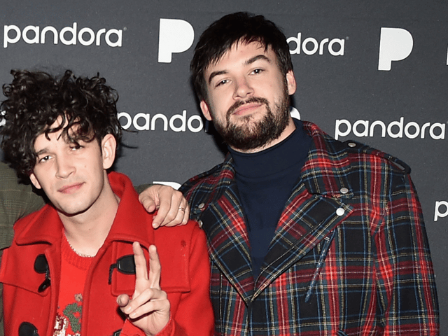The 1975's set in Malaysia was cancelled after Matty Healy and Ross McDonald kissed on stage - Credit: Getty