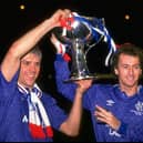 Graham Roberts (left) and Trevor Francis (right) both of Rangers  hold the trophy aloft after their victory in the Skol Cup Final against Aberdeen in 1988
