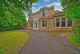 The facade of the blonde sandstone property