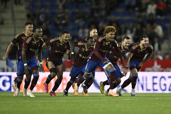 Servette’s players celebrate after winning against Belgian KRC Genk