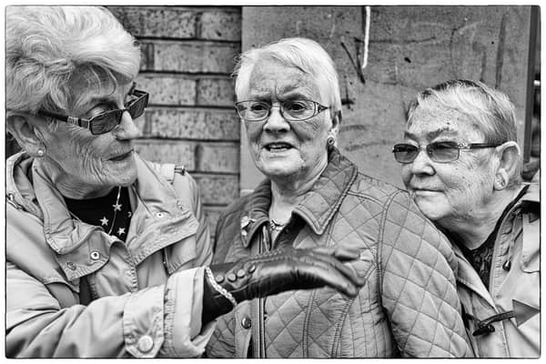 Three sisters in Glasgow - a piece of street photography by Iain Clark
