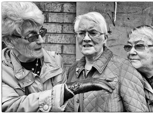 Three sisters in Glasgow - a piece of street photography by Iain Clark
