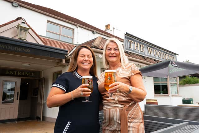 Publican Anne Dickie has received a long service certificate for more than 20 years running The Woodend Bar in Mount Vernon ,Glasgow and nearly 50 years running pubs around Glasgow as she retires and passes the keys onto the next generation, her daughter Lesley Weaver.