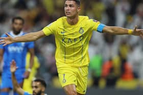 Cristiano Ronaldo celebrates a goal in the Arab Club Champions Cup.